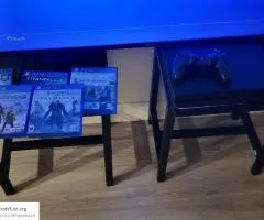 PS4 Pro 1tb with cabels and 5games